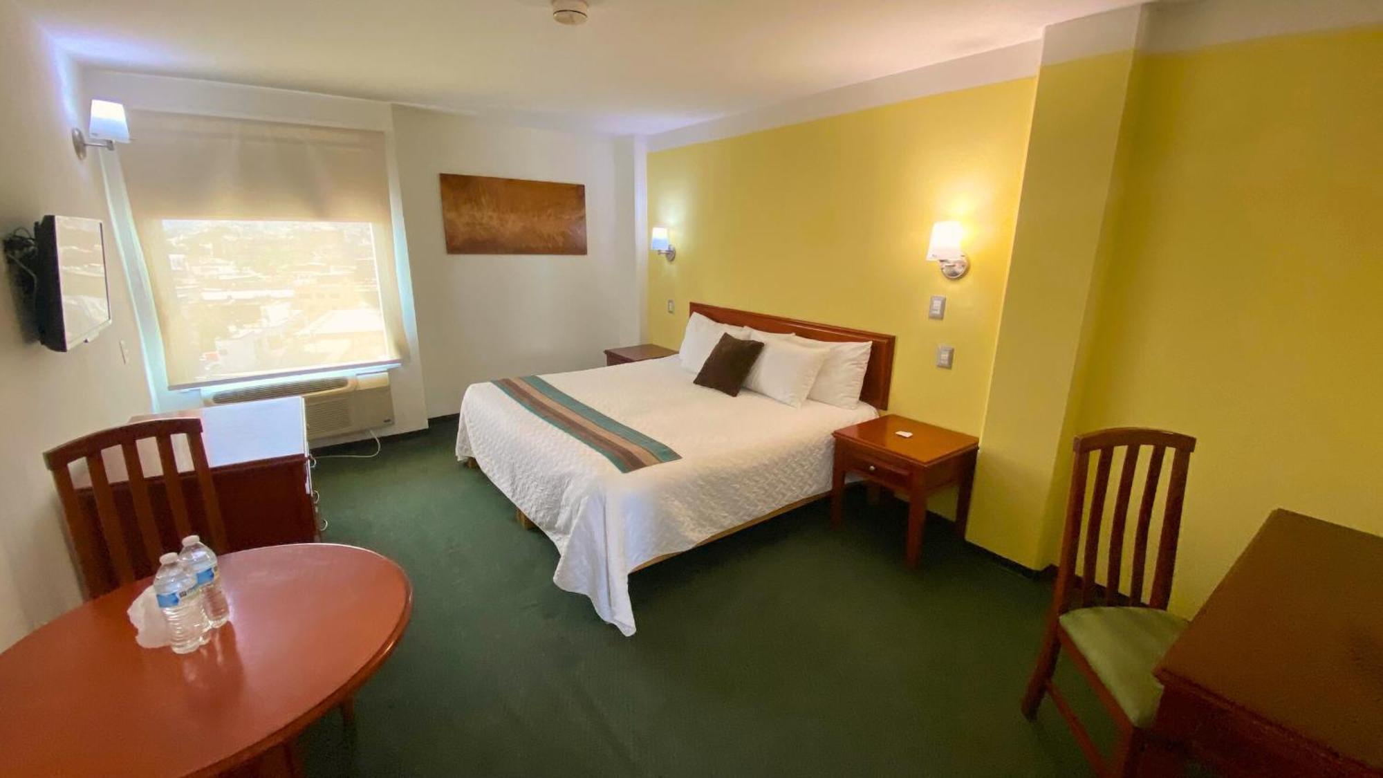Hotel Enterprise Inn Poliforum León Buitenkant foto